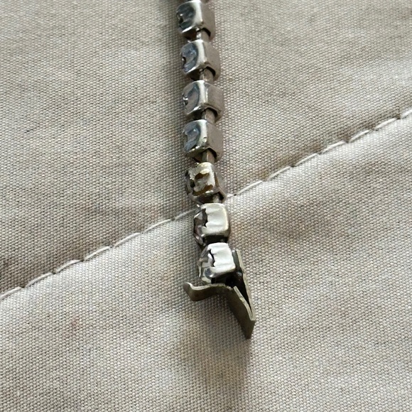 Tennis bracelet w/Clear Round prong set rhinestones & 1 large on clasp - Picture 7 of 15